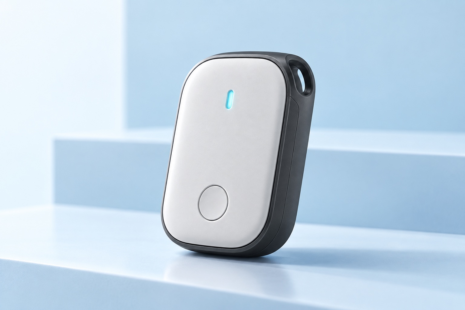 Compact white GNSS asset tracker on a pale-blue studio background
