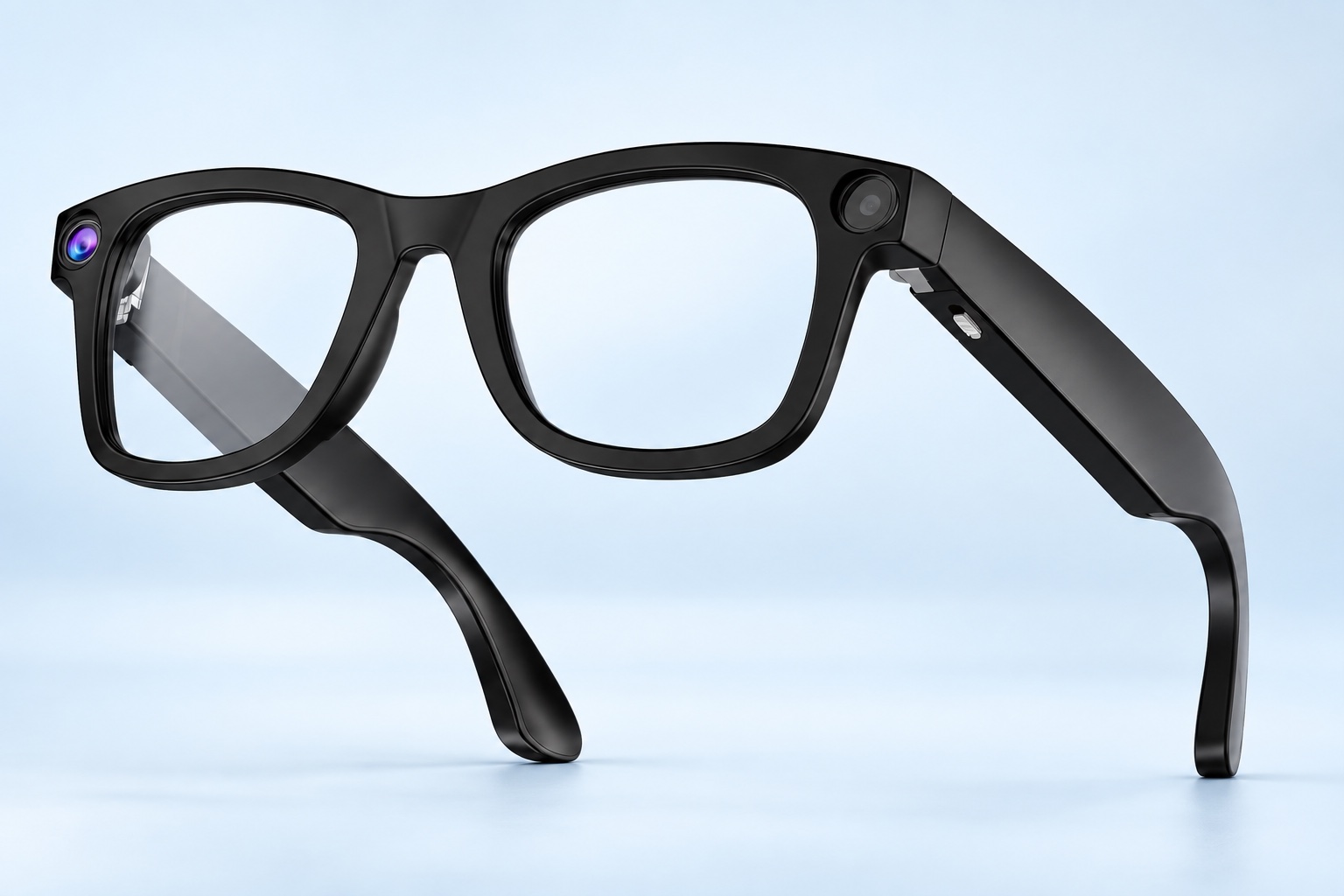 Black smart glasses with an integrated camera on a pale-blue studio background